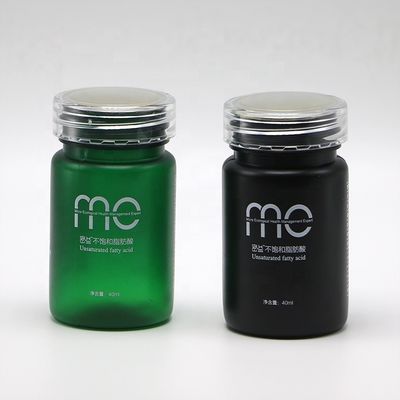 Στρογγυλό σχήμα 70ml PET πλαστικό μπουκάλι με καπάκι βίδα και εξειδικευμένη υπηρεσία εκτύπωσης ετικέτας
